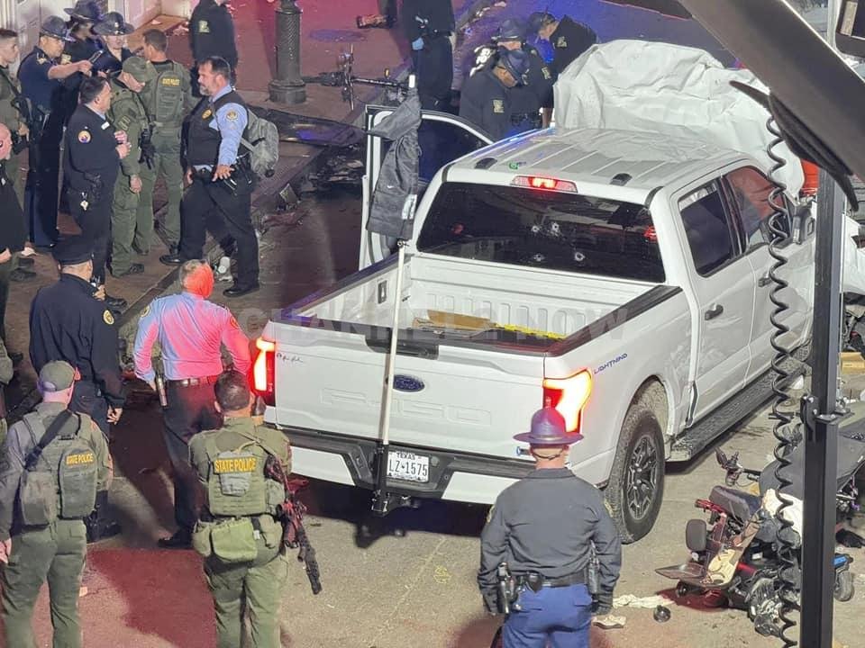 At least 12 people killed after driver in pickup truck plows into crowd in New Orleans, followed by gunfire