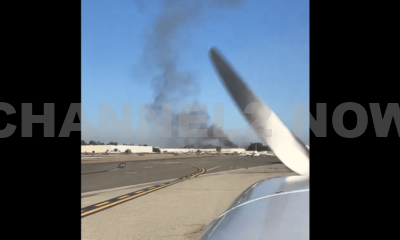 Emergency responders are on the scene of a plane crash that occurred in Fullerton, California, where smoke was seen billowing from the impact site. The incident reportedly involved an aircraft colliding with a building, sparking a significant fire.